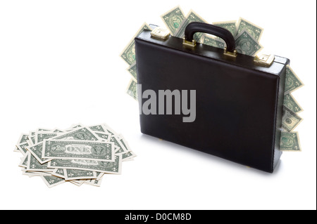 briefcase stuffed with cash and american us dollars in a heap isolated on white Stock Photo