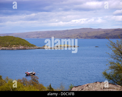 Small boat moored in Loch Torridon on the Applecross Peninsula close to Shieldaig on the West Coast of Scotland Stock Photo