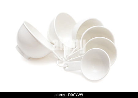 Set of piece measuring cups for food substance isolated on white background Stock Photo