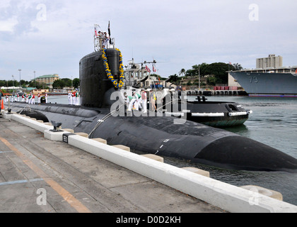 The Virginia-class fast attack submarine USS Hawaii (SSN 776) returns to Joint Base Pearl Harbor-Hickam after completing a six-month deployment to the western Pacific region. The submarine was named to recognize the tremendous support the Navy has enjoyed Stock Photo