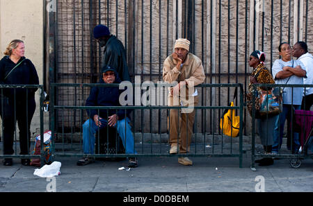 Nov. 22, 2012 - Los Angeles, California, U.S. - People line up for the Fred Jordan Mission's 69th annual Thanksgiving dinner for 2,500 poor and homeless children, women and men on skid row in downtown Los Angeles.(Credit Image: © Brian Cahn/ZUMAPRESS.com) Stock Photo