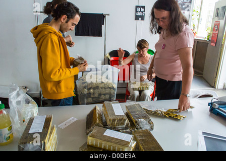 Paris, France, Act Up-Paris, AIDS Activists preparing Condoms for Free Distribution at Gay Pride, Volunteers in Europe, volunteer NGO work man Stock Photo