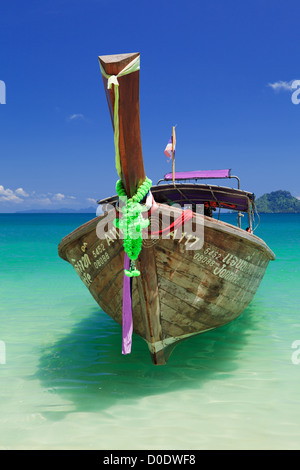 The long-tail boat, known as Ruea Hang Yao (เรือหางยาว) in the Thai language, is a type of watercraft native to Southeast Asia. Stock Photo