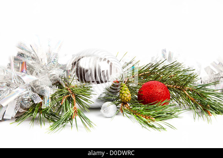 Christmas holiday composition with balls and fir branch isolated on white Stock Photo