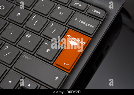 Download Return Key symbolizing the downloading of a document or file from the internet Stock Photo