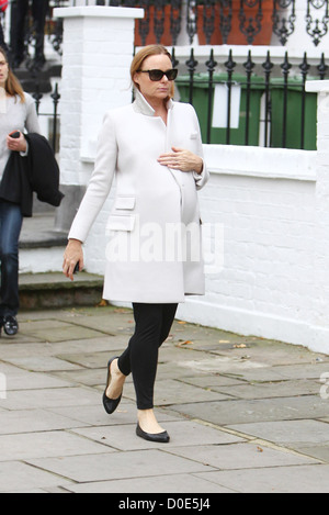 A heavily pregnant Stella McCartney makes her way home after taking her children to school. Fashion designer Stella is Stock Photo