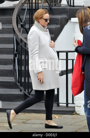 A heavily pregnant Stella McCartney makes her way home after taking her children to school. Fashion designer Stella is Stock Photo