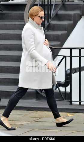 A heavily pregnant Stella McCartney makes her way home after taking her children to school. Fashion designer Stella is Stock Photo