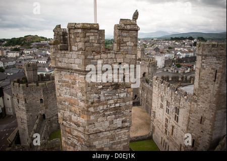 CAERNARFON, Wales — The Eagle Tower at Caernarfon Castle in northwest Wales. A castle originally stood on the site dating back to the late 11th century, but in the late 13th century King Edward I commissioned a new structure that stands to this day. It has distinctive towers and is one of the best preserved of the series of castles Edward I commissioned. Stock Photo