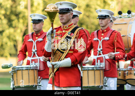 ARLINGTON, Virginia, United States — The United States Marine Corps Drum and Bugle Corps, also known as the Commandant's Own, performs during the Sunset Parade at the Iwo Jima Memorial. This weekly summer event honors the sacrifices of Marines and celebrates the Marine Corps' rich history. Stock Photo