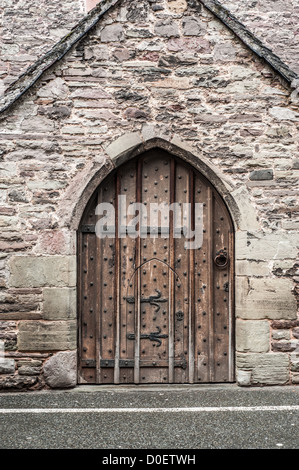 A double-door (one small one inside the other) on the Parish Church of St Mary's in Brecon, Wales. Stock Photo