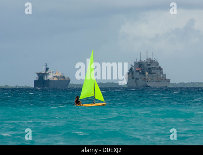 A US Sailor sails on a Pico sailboat November 4, 2012 In Diego Garcia, British Indian Ocean Territory. Stock Photo