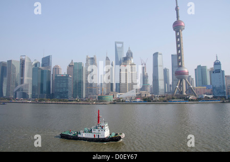 China, Shanghai. Evening view of the modern Pudong area (aka New District) with the famous 'Oriental Pearl'. Stock Photo