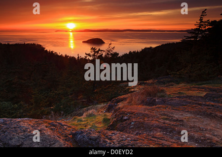 Sunset from Goose Rock, looking out on Rosario Straight and Deception Island, Deception Pass State Park, Washington. Stock Photo