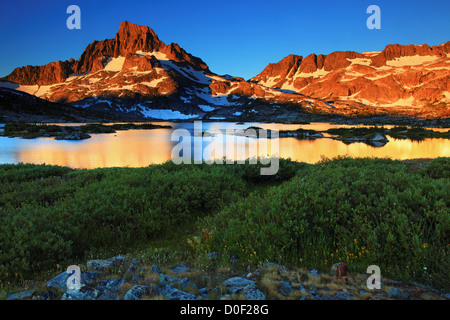 Sunrise over Banner Peak and Thousand Island Lake in the Ansel Adams Wilderness, California. Stock Photo