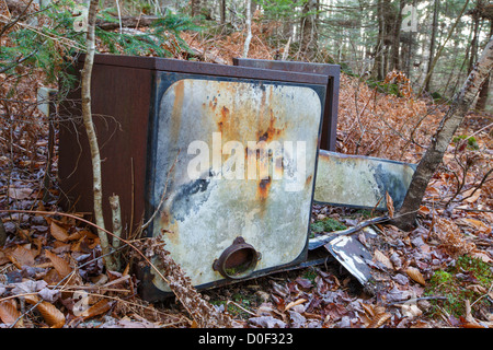 Remnants of a Kitchen Kook Stove Range #866 by American Gas Machine Company, Inc at the abandoned cabin settlement surrounding Elbow Pond in Woodstock, New Hampshire USA Stock Photo