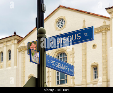 Street sign at intersection of Rosemary Ave and Hibiscus St with Harriet Himmel Theater behind, West Palm Beach, Florida, USA Stock Photo