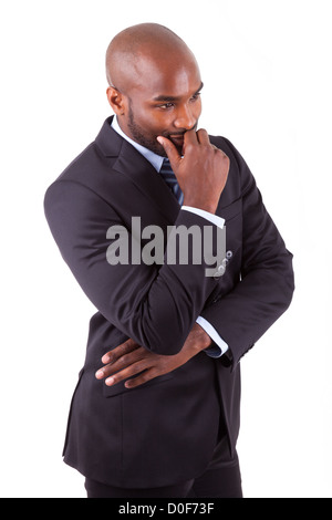 Portrait of a young African American business man thinking, isolated on white background Stock Photo