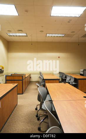 modern college classroom desks with roller chairs Stock Photo