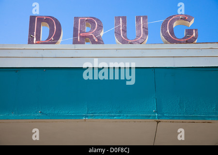 The word DRUG on a neon sign in Austin, Texas Stock Photo