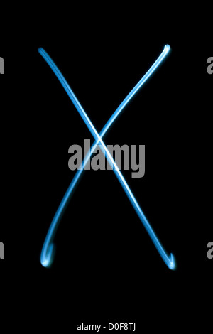 The letter X from natural neon light. Stock Photo