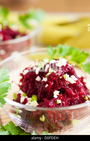Salad of shredded beets with garlic, close up Stock Photo
