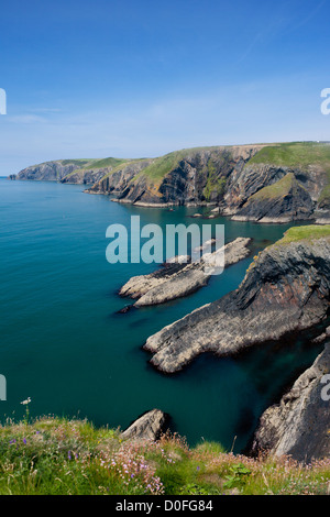 Ceibwr Bay Near Moylegrove Rocky wild coastal scenery with stormy sea West Wales UK Stock Photo
