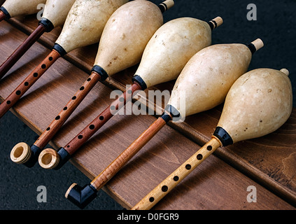 Whistles for bagpipes, made from different types of wood. Stock Photo