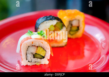 different sushi rolls on a plate , Traditional Japanese cuisine Stock Photo