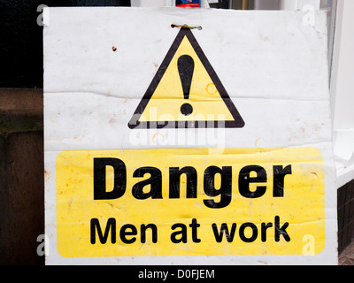 Danger sign warning 'Men at Work' Stock Photo