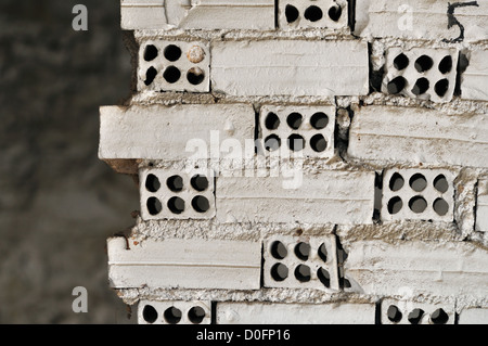 Broken grungy white brick wall background texture. Stock Photo