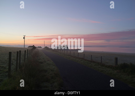 dh Scapa Flow ORPHIR ORKNEY Scottish Cottages in mist morning sunrise dew uk dawn house scotland sun rise Stock Photo