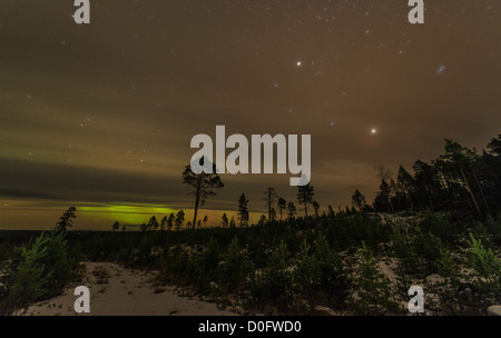 Northern light or Aurora Borealis Nellim near Inari Lake Lapland Finland Stock Photo