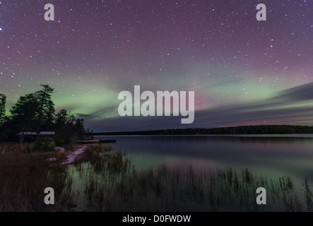 Northern light or Aurora Borealis Nellim near Inari Lake Lapland Finland Stock Photo