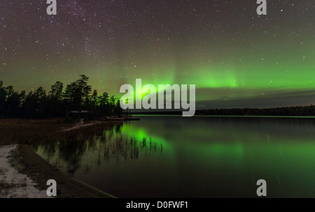 Northern light or Aurora Borealis Nellim near Inari Lake Lapland Finland Stock Photo