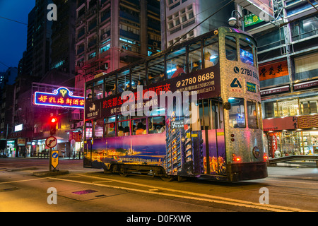 Night view of a double decker tram in Central Hong Kong, China Stock Photo