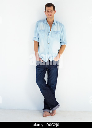 Young male poses for a barefooted, isolated shot Stock Photo