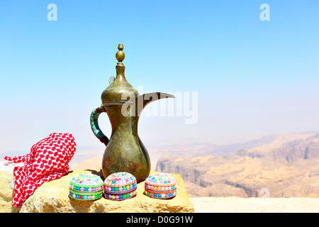 Arabian souvenirs on the stone and Jordan's mountains in the background
