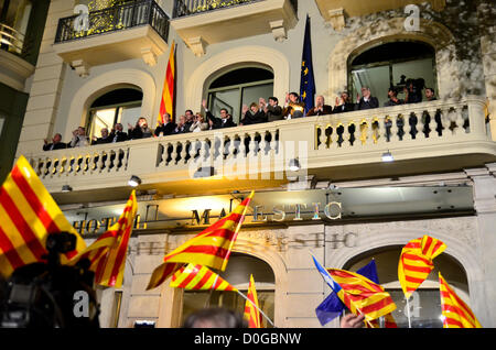 Artur Mas, president of the Generalitat of Catalunya and candidate CiU to catalan regional elections of September 25st, has lost support for a referendum of independence of Catalonia from the rest of Spain. In photography, Artur Mas, with hand up, waving to supporters with Catalonian flags near Majestic Hotel in Barcelona. Stock Photo