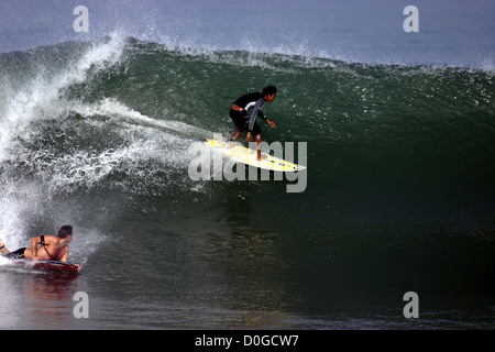 A body boarder rides a wave in the Indian Ocean on Durban's Bay of ...