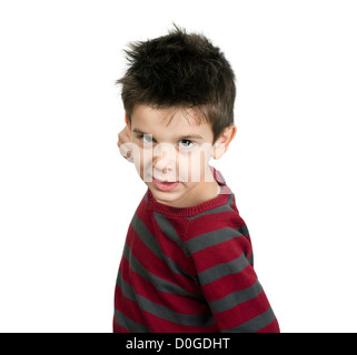 Little boy threatens with a fist to fight. White isolated Stock Photo