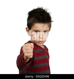 Little boy threatens with a fist to fight. White isolated Stock Photo