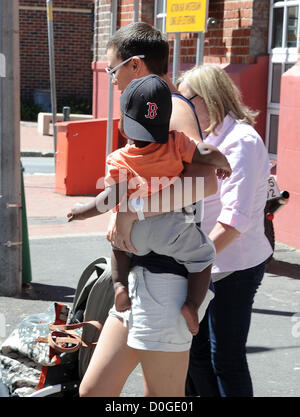 CAPE TOWN, SOUTH AFRICA: Charlize Theron and her mother Gerda and her adopted son, Jackson, in Green Point on November 23, 2012 in Cape Town, South Africa. The actress is in Cape Town to shoot the final scenes for the Australian blockbuster 'Mad Max 4: Fury Road'.  (Photo by Gallo Images / Foto24 / Nasief Manie) Stock Photo