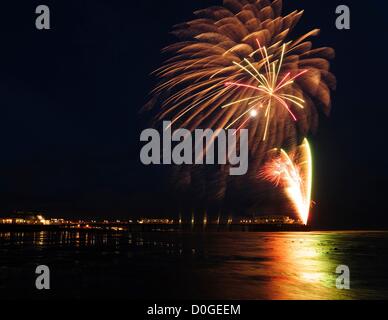 Worthing Pier Fireworks on 25/11/2012 at Worthing Pier, Worthing. A firework display was launched in the strong wind and rain to celebrate the start of the Christmas Shopping period. Picture by Julie Edwards Stock Photo