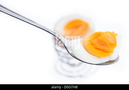 Breakfast Egg on a spoon (white background) Stock Photo