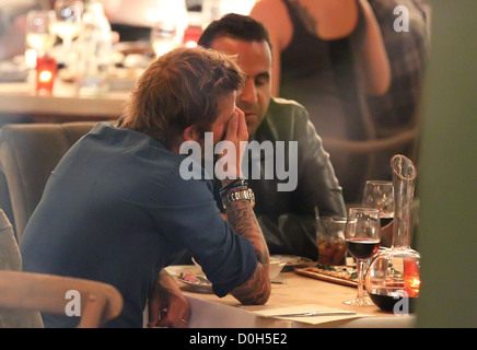 David Beckham having dinner with Iranian-American entrepreneur Sam Nazarian and his new girlfriend at Cleo restaurant in Stock Photo