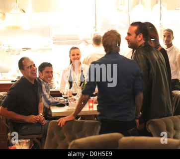 David Beckham chats to the Cleo restaurant staff after having dinner with Iranian-American entrepreneur Sam Nazarian and his Stock Photo
