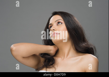 Close-up of a young woman thinking Stock Photo