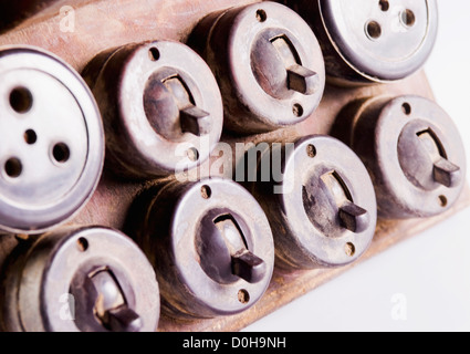 Close-up of old lightswitches and sockets Stock Photo