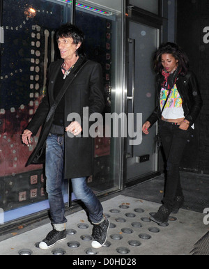 Ronnie Wood and girlfriend Ana Araujo arrive at The Ivy club London, England - 16.09.10 Stock Photo